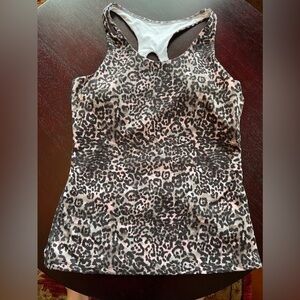 Aonour Yoga Top with Built-in bra. 90% polyester 10% spandex.